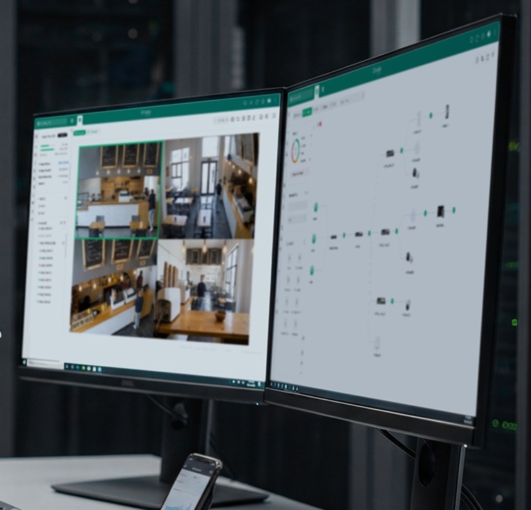 Official Fusion web management image showing network topology and live video on desktop monitors